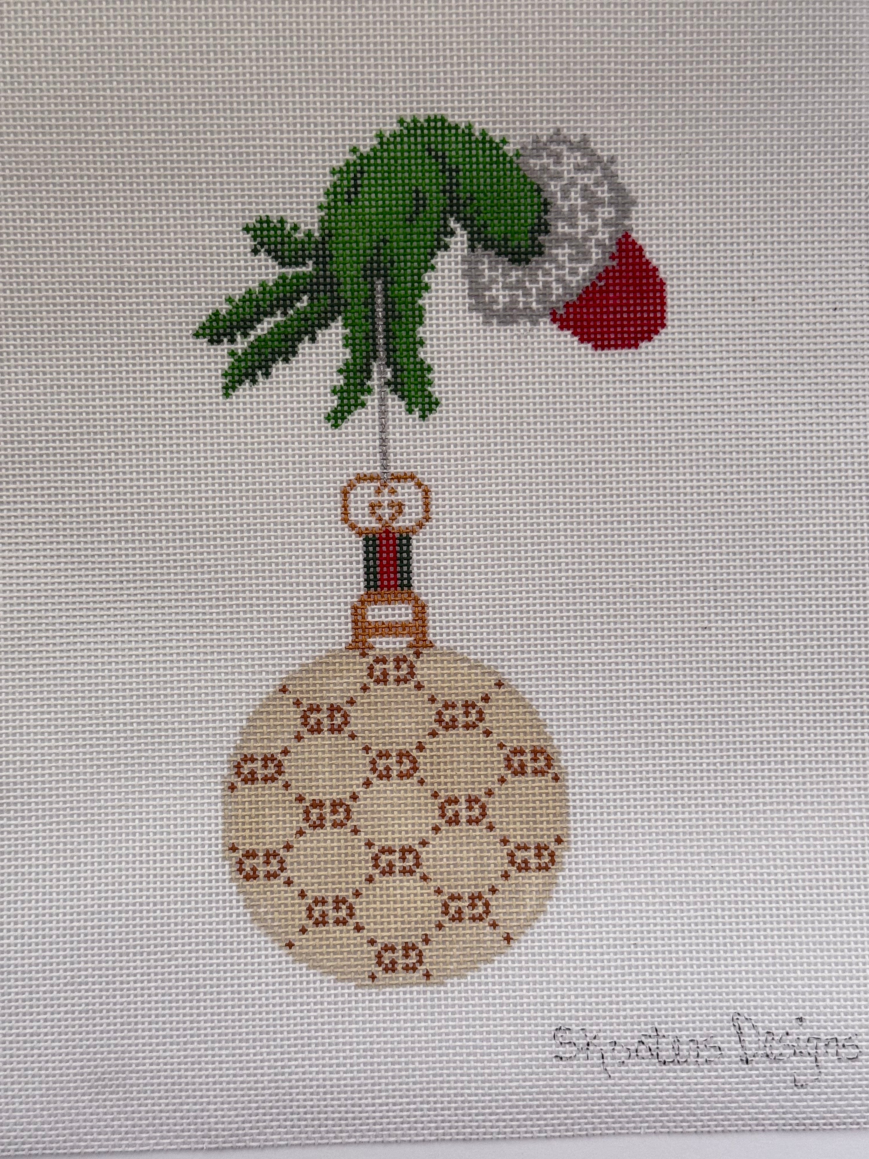 GG Ornament With Green Hand