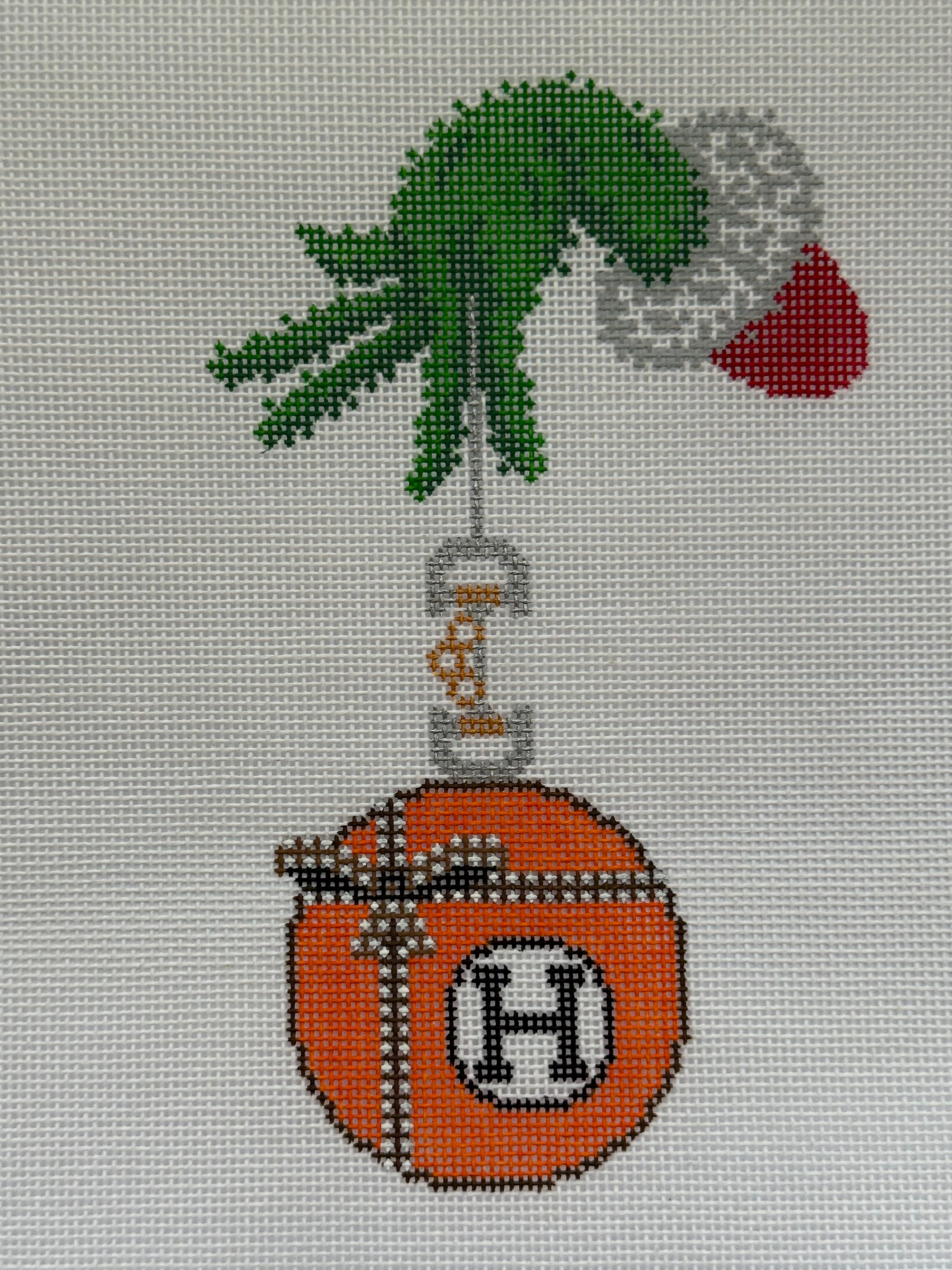 H Ornament With Green Hand